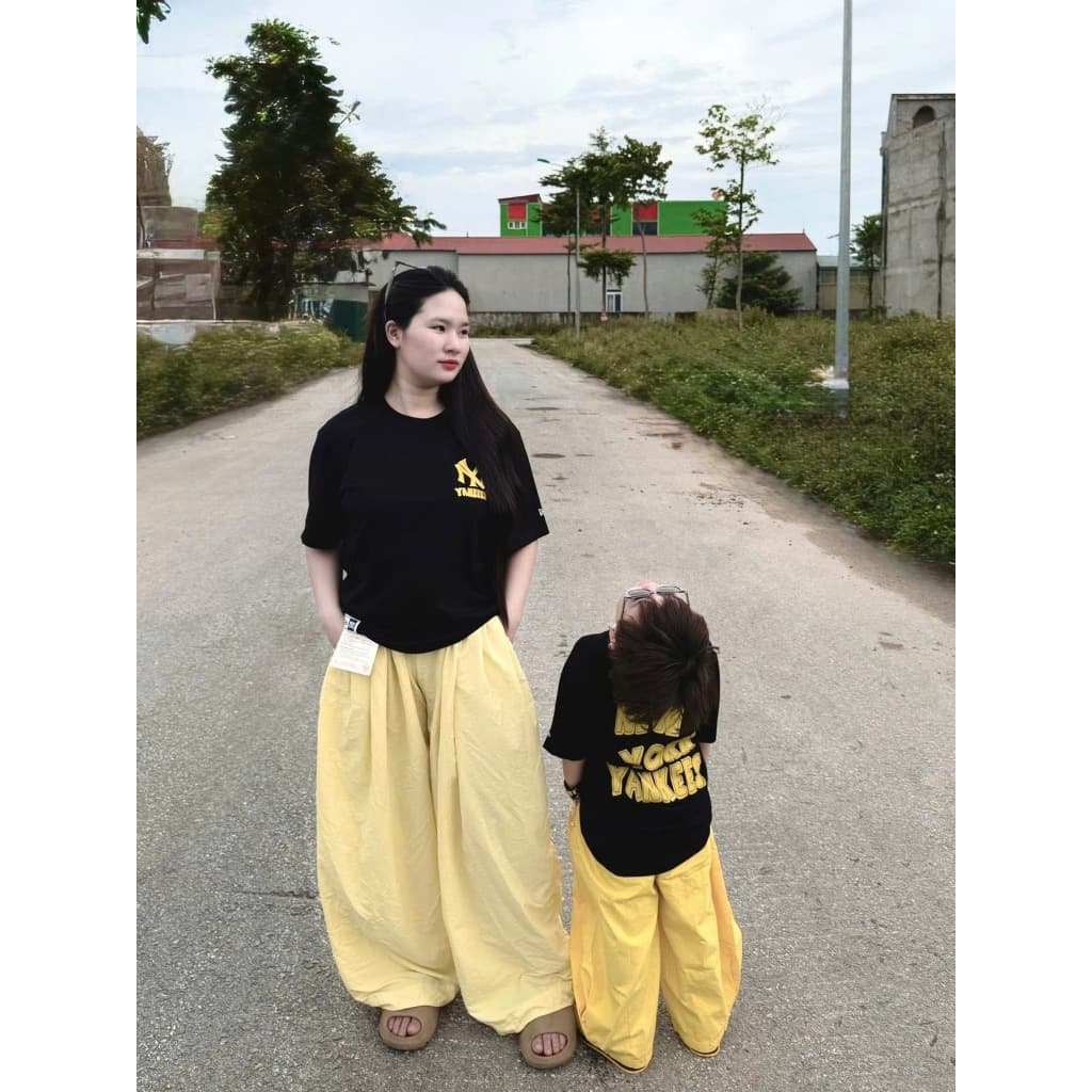 Áo thun cho bé hình newyork vàng